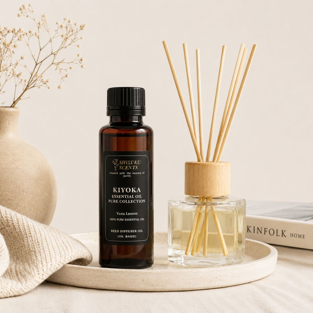 Kiyoka essential oil bottle with diffuser bottle and reed sticks