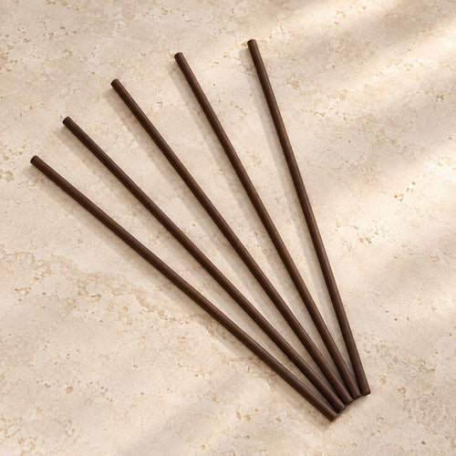 Five Deep Brown Kaze reeds arranged in a fan
