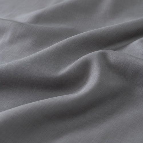Macro view of the smooth Classic Grey HaruKumo Lyocell fabric surface.